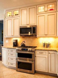 Note that final price may be affected by additional fees, services, taxes and shipping. Bump up the cabinets above stove to make more room for range hood microwave. And break up the ...