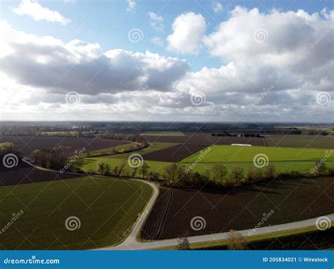 Aerial View Of Farmlands Under A Cloudy Sky Stock Image Image Of