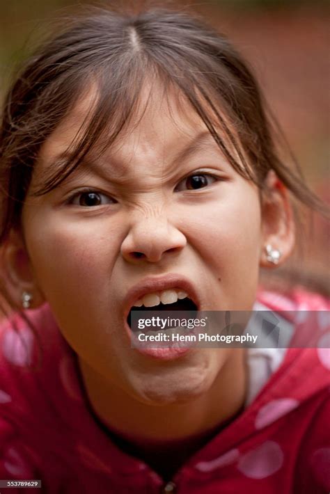 Portrait Of Angry Mixed Race Girl Screaming Stock Foto Getty Images