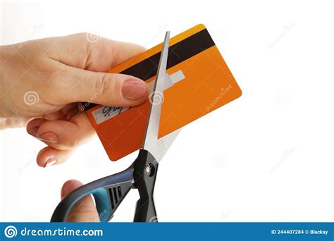 Woman Cutting Her Credit Card With A Scissors Stock Photo Image Of