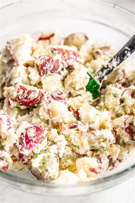 To make the sour cream potato salad with bacon, start by cooking the potatoes as instructed above. Red skin sour cream potato salad-6 - Sweetphi
