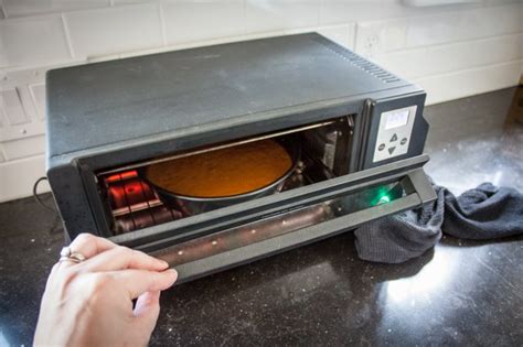 How to bake a cake using a sufuria in an oven. How to Bake a Cake in a Toaster Oven | LEAFtv