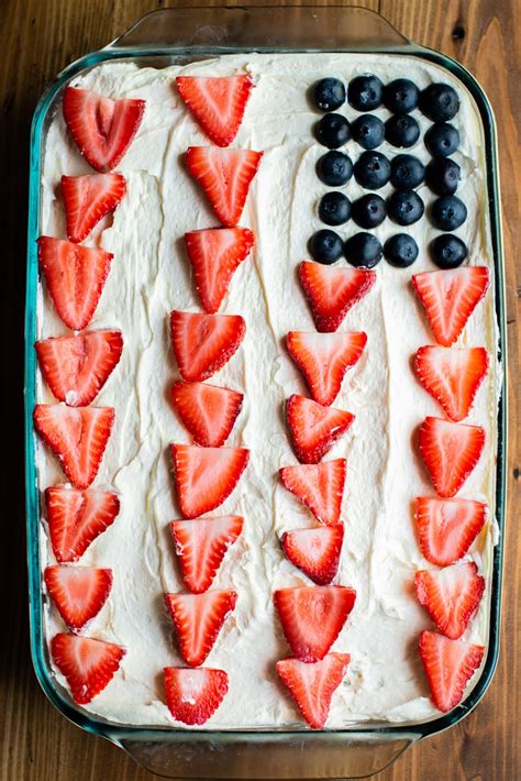 Once the cake has cool, use the bottom of a wooden spoon to poke 20+ holes in the cake. Flag Decorated Jello Poke Cake - Vintage Recipe Tin ...