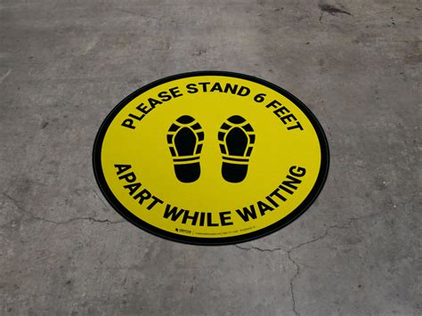 Please Stand 6 Feet Apart While Waiting Shoe Prints Yellow Circular