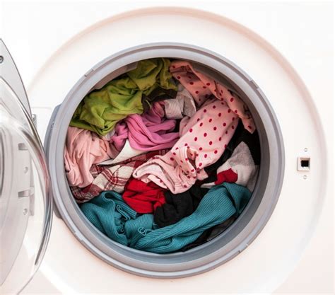 Wash light colored clothes in hot water with a warm or cold rinse. Washing Machine Not Cleaning Clothes? | ThriftyFun