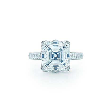 Square Step Cut Diamond Ring In Platinum With Round Brilliant Diamonds