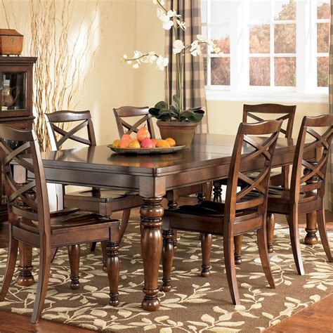 Rich burnished dark brown wood finish. Ashley Furniture Porter D697-35 Rectangular Extension ...