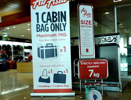 Airasia allows you to carry one piece of cabin baggage. AirAsia enforced 7kg limit for carry-on luggage - MIKEYIP.COM