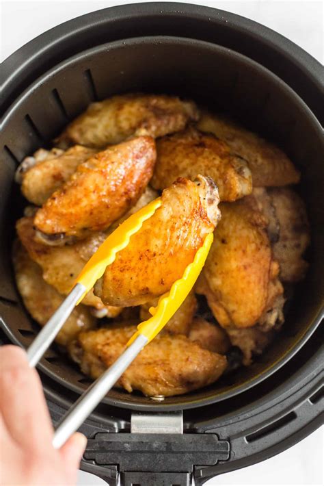 Air frying chicken wings make the most crispy wings with no oil required. Crispy Air Fryer Chicken Wings (Gluten-Free) - Dish by Dish