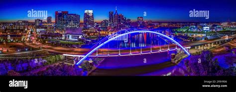 Cityscape With Gateway Bridge Illuminated At Night Nashville