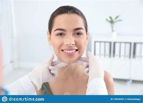 Dermatologist Examining Patient`s Face In Clinic Stock Image Image Of Health Examining