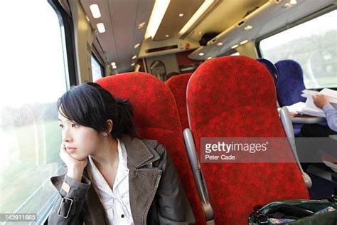 Asian Girl Looking Out Train Window Photos And Premium High Res Pictures Getty Images