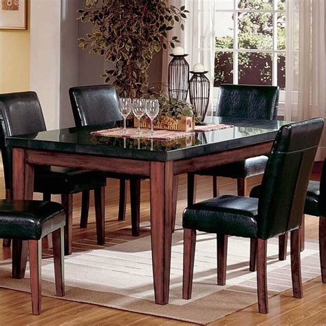 Side chairs can have upholstered seats, but are generally not fully upholstered. Steve Silver Company Bello Granite Casual Dining Table in ...