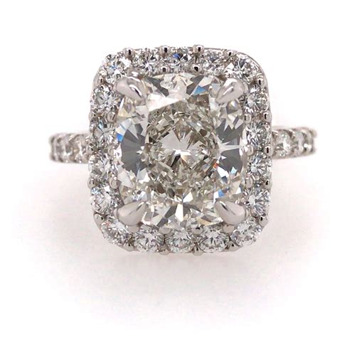 WHITE GOLD ENGAGEMENT RING WITH CUSHION CUT CENTER DIAMOND Simmons