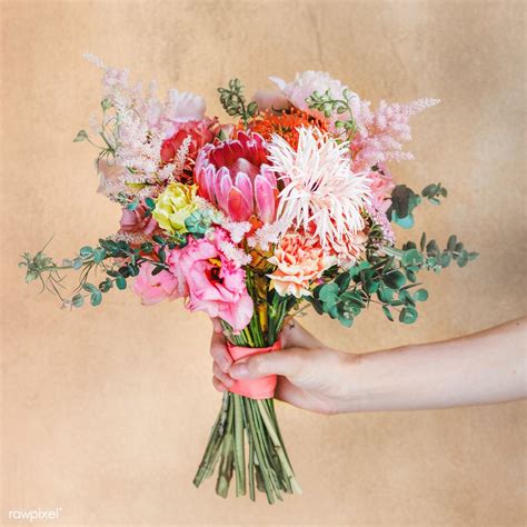 A new hub is available, which can contain up to 50 more changes: Download premium image of Woman holding a bouquet of ...