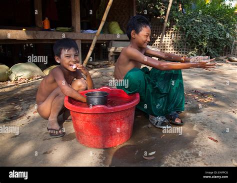 Rohingya Children Having A Bath Thandwe Myanmar Stock Photo Alamy