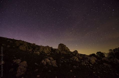 Starry Night Over The Rocks At The Mountain Side By Cosma Andrei