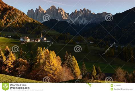 Sunset On The Alpine Village Of Santa Magdalena In Val Di Funes With