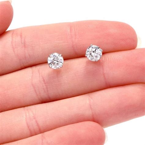 Please phone a diamond and jewelry. 1.75 Carat Total Diamond Platinum Stud Earrings at 1stdibs