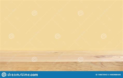 Empty Of Wood Table Top On Yellow Pastel Color Background Stock Image