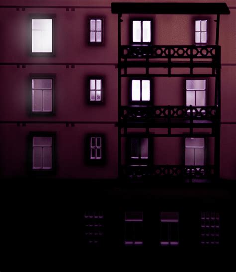 Apartment Building At Night With Lights By Michael Duva