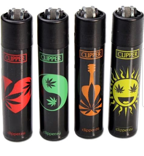 Four Lighters With Different Designs On Them