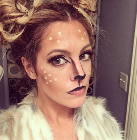 A Woman With Fake Nose And Cat Makeup