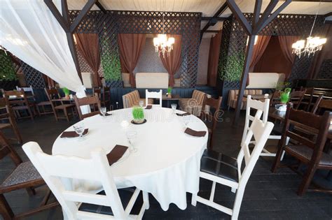 There is nothing like a round table pizza and i crave it round table pizza is a part of the global franchise group family, which also holds the following. Round table in restaurant stock image. Image of hall ...