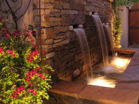 Dancing Light On Pour Over Stone Water Feature Waterfalls Backyard