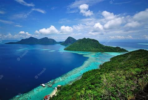 Premium Photo Aerial View Of Tropical Island Of Bohey Dulang Near