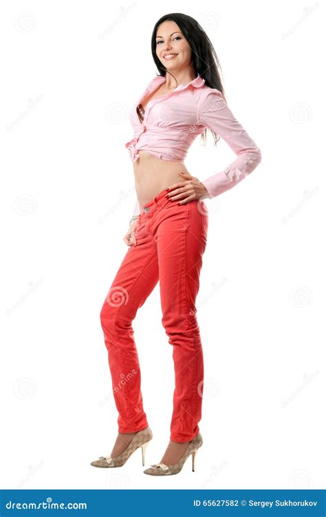 Lächelnder Schöner Junger Brunette In Den Roten Jeans Stockfoto Bild Von Kaukasisch Glück