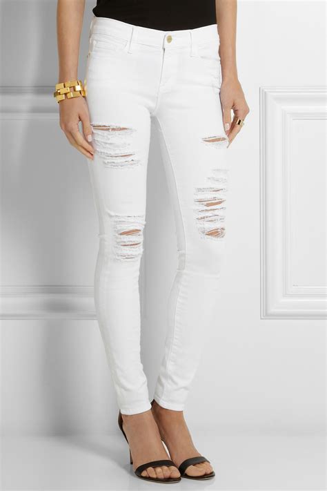 Frame Denim Le Skinny De Jeanne Distressed Mid Rise Jeans In White Lyst