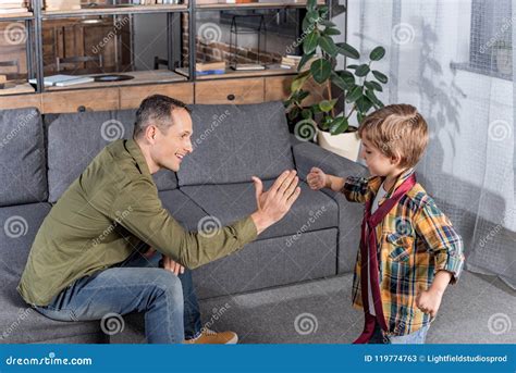 Side View Of Father Teaching Son To Tie Necktie Stock Image Image Of