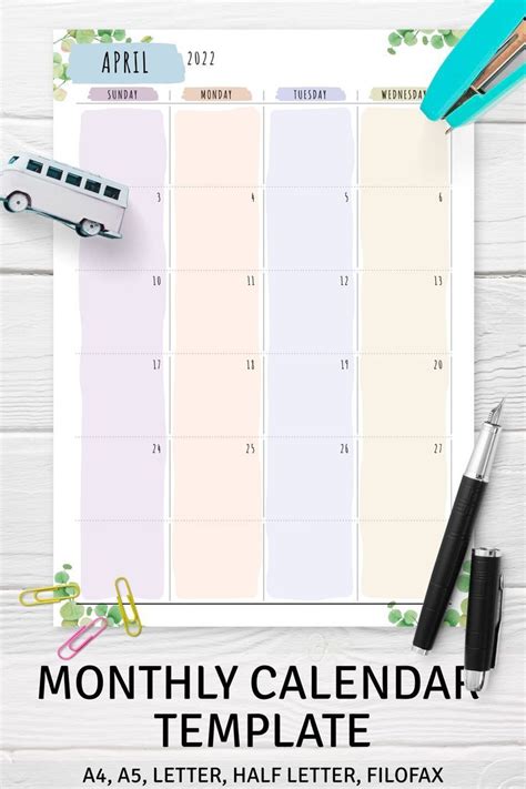 The Printable Month Calendar Is Shown On Top Of A Desk With Pens And