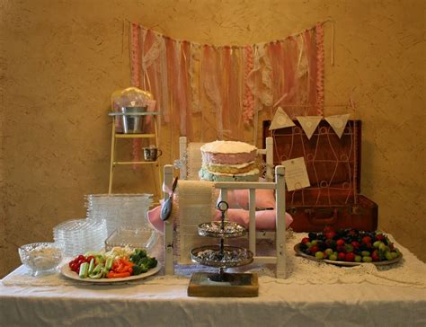 The idea to use baby drinking bottles for all the guests at the baby shower is a fun one. A Vintage Baby Shower - Dukes and Duchesses