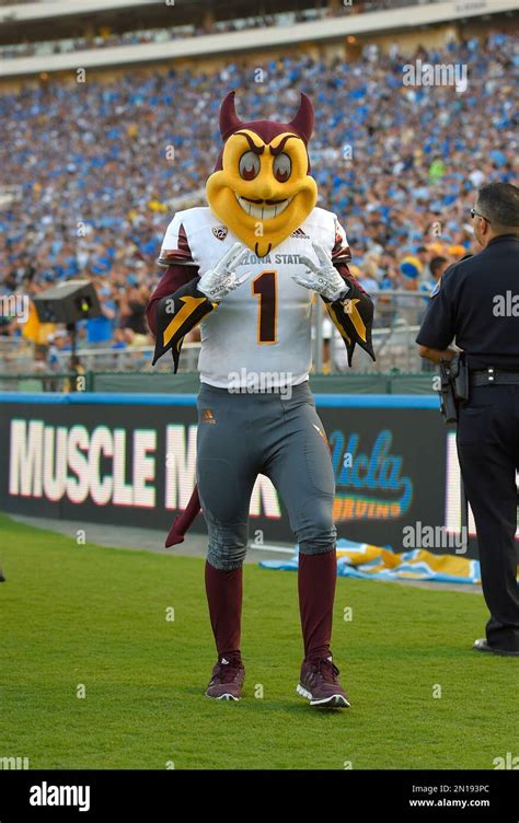 Arizona State Mascot Sparky Gestures During The First Half Of An Ncaa