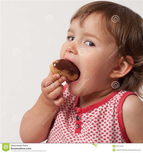 2 Year Old Baby Eating Sweets With Gluttony Stock Image Image Of Baby