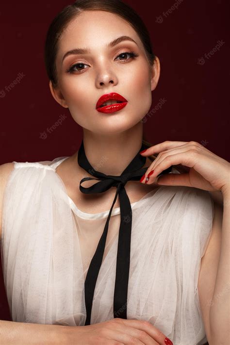 Premium Photo Beautiful Girl In White Dress With Classic Makeup And Red Manicure Beauty Face