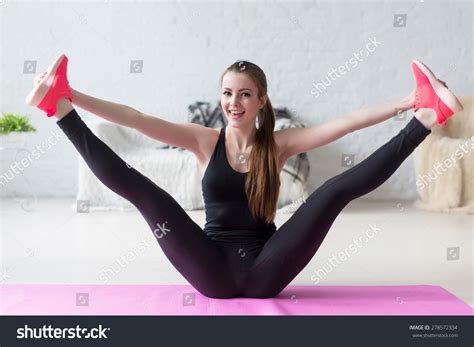 Funny Smiling Girl Holding Legs Apart Doing Exercises Aerobics Warming
