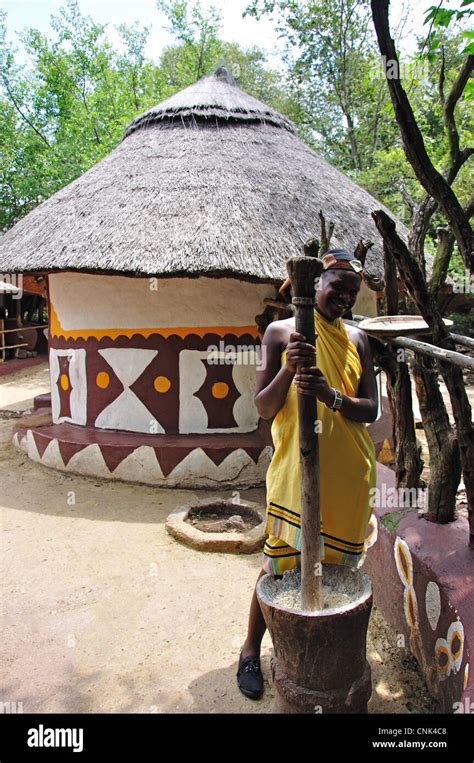 Girl Grinding Corn In Pedi Village Lesedi African Cultural Village