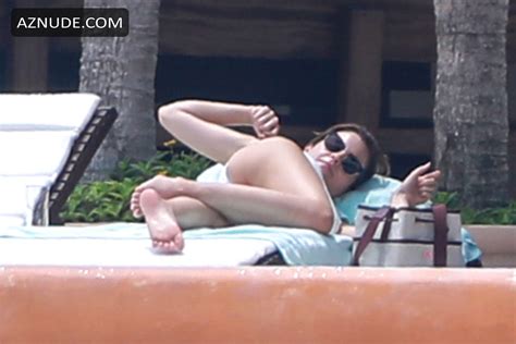 Emma Watson Wearing A Two Piece White Bikini While Enjoying Some