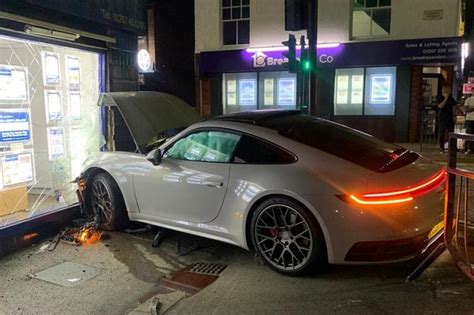 Man Arrested After Porsche Ploughs Into Estate Agents In Late Night