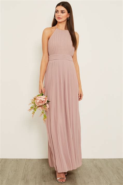 The dresses will range in price from $225 to $695, but are meant to be classic items that can be worn again and again. TFNC SERENE MAUVE MAXI DRESS | TFNC PARTY DRESSES