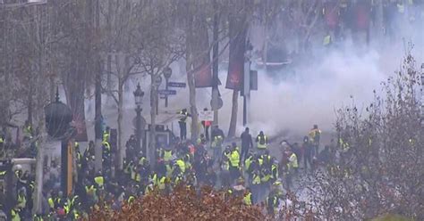 French Police Fire Tear Gas At Protesters In Paris Cbs News