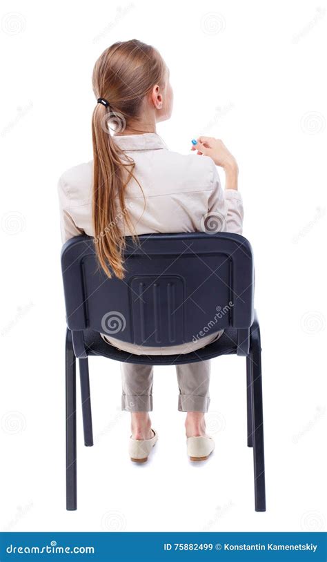 Back View Of Young Beautiful Woman Sitting On Chair Stock Image