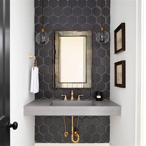 Bathroom With Black Matte Hex Tile On Accent Wall And Floating Concrete