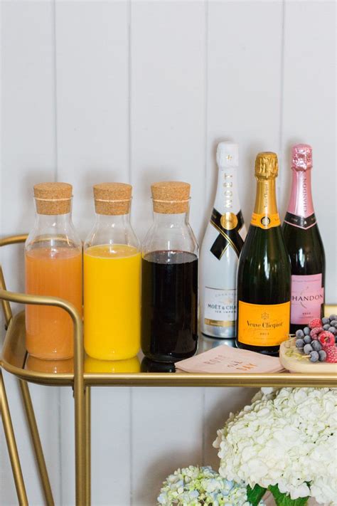 Prettiest Mimosa Bar With Frosted Berry Garnishes To Have To Host