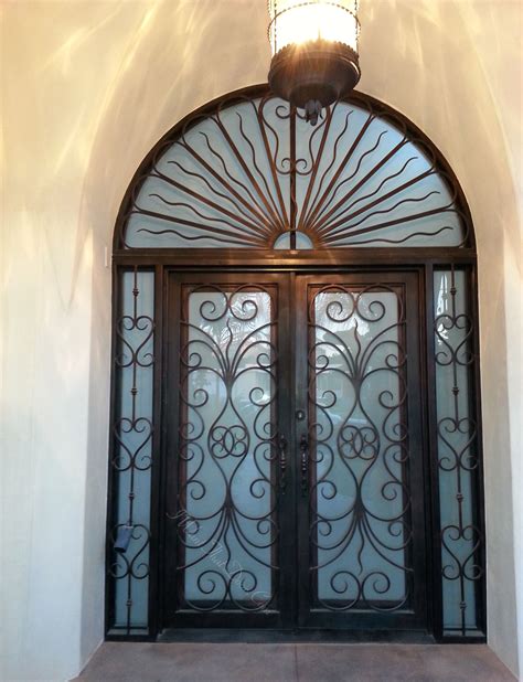 Revenna Wrought Iron Double Door With Sidelights And Transom Installed By UID Call Now And Get
