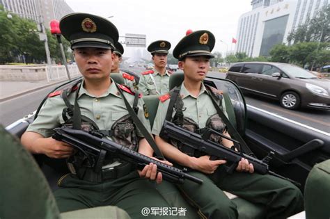 Police Officers Carrying Guns Go On Patrol In Beijing 16 Headlines Features Photo And