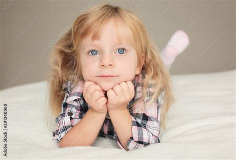 Close Up Portrait Of Cute Blonde Toddler 3 Years Old Girl With Big